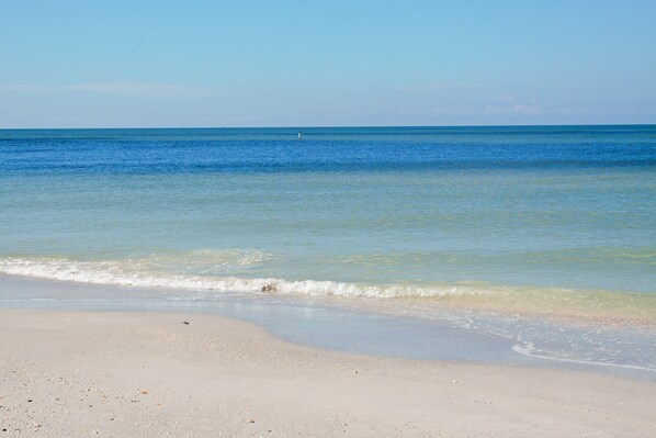 On the beach, sun-loungers, beach towels