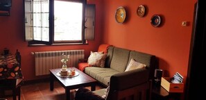 Apartment, 2 Doppelbetten, Meerblick | Wohnbereich