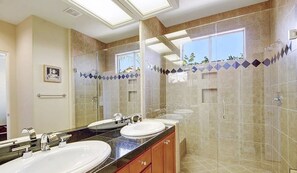 Bathtub, jetted tub, hair dryer, towels
