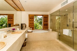 Bathtub, hair dryer, towels, soap