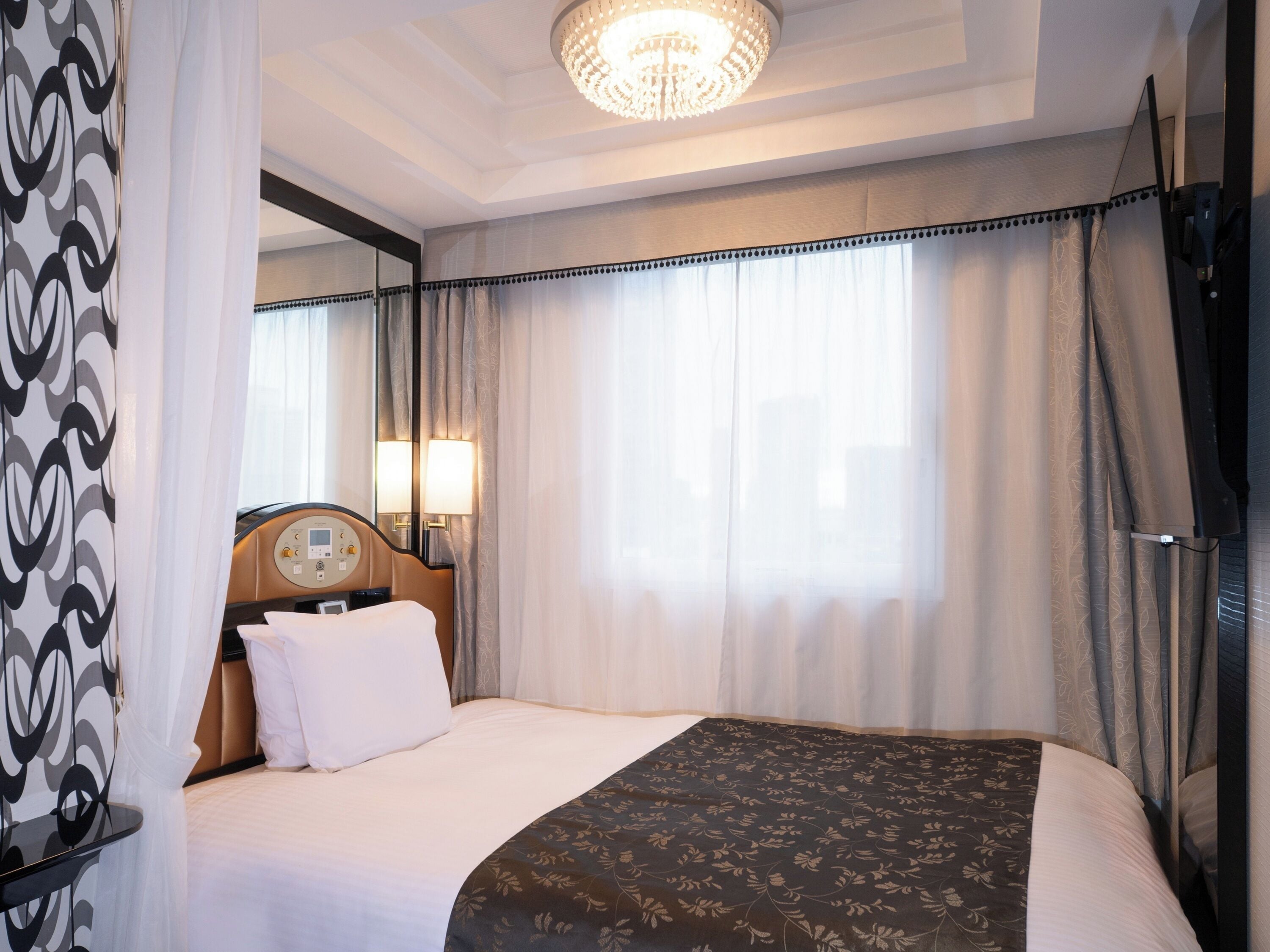 Desk, blackout curtains, free WiFi, bed sheets