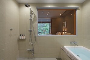 Garden Deluxe Room | Bathroom | Separate tub and shower, deep soaking tub, free toiletries, hair dryer
