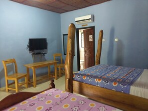 Comfort Triple Room, 2 Double Beds | In-room safe, individually decorated, desk, blackout drapes - Big Foot Safari Lodge (Wli)