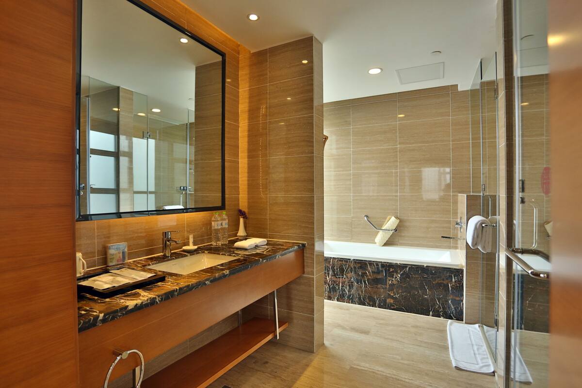 luxury suite | bathroom | free toiletries, hair dryer, bathrobes, slippers