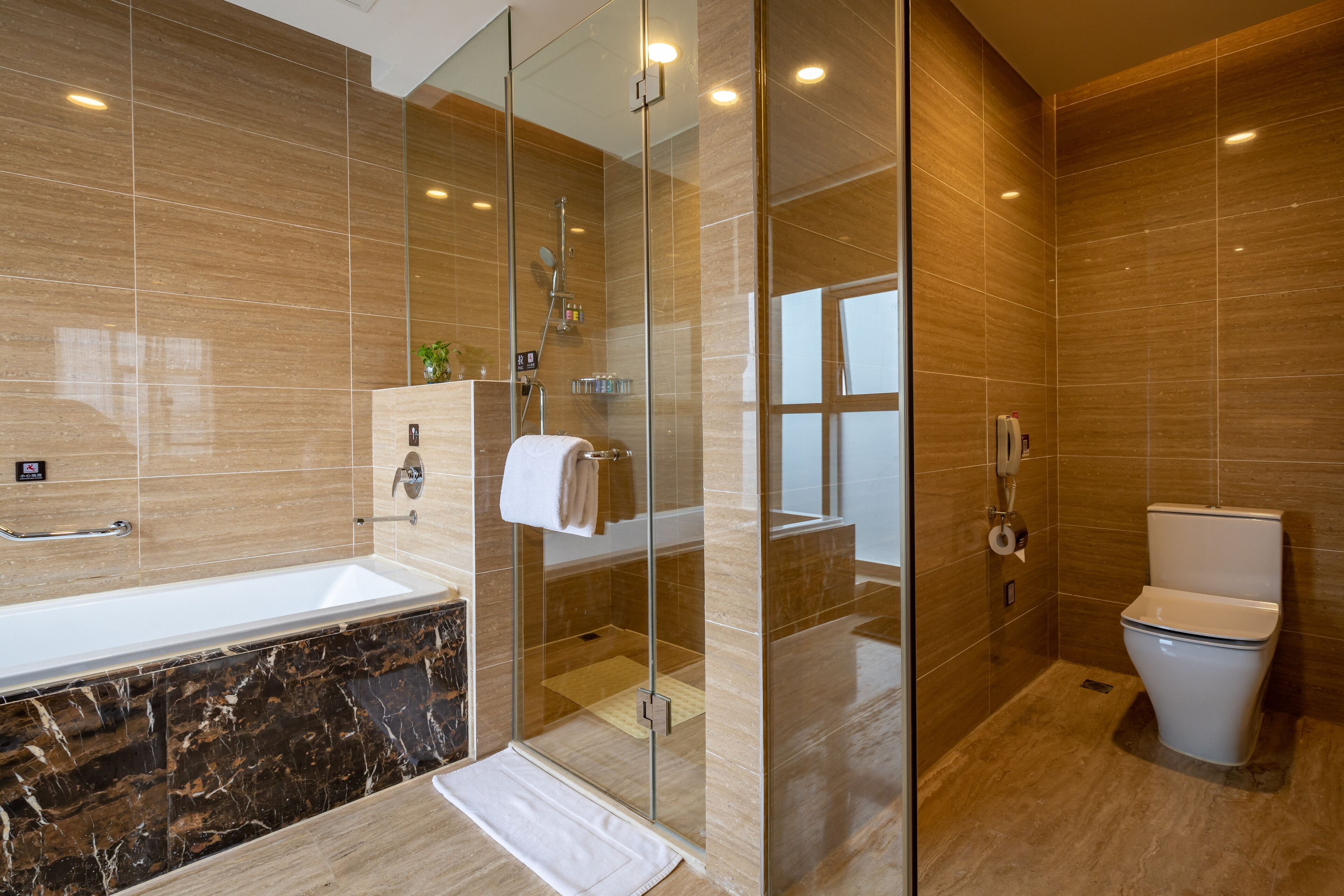 executive suite | bathroom | free toiletries, hair dryer, bathrobes, slippers