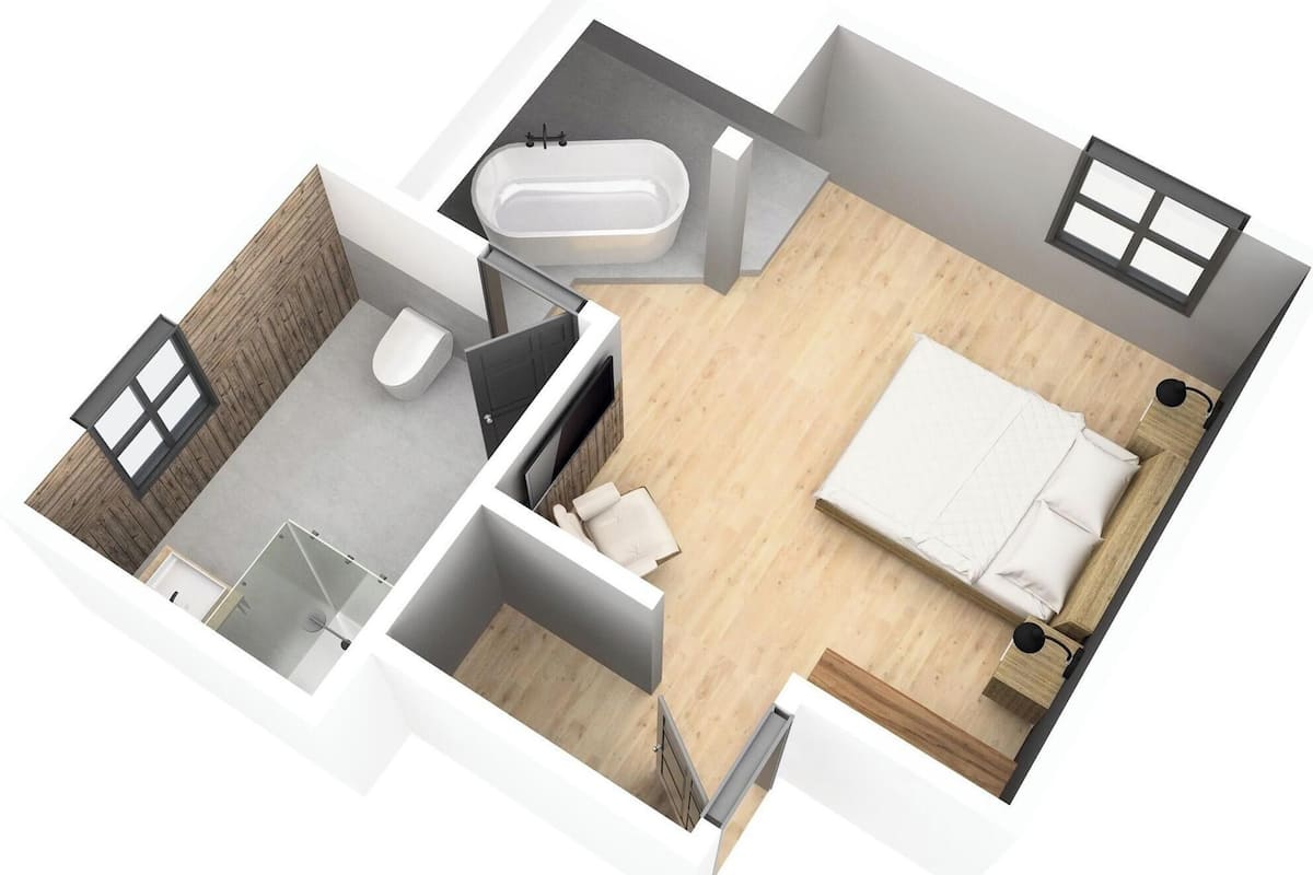 A 2-bedroom apartment with a bathroom, a small kitchen, and a living area.