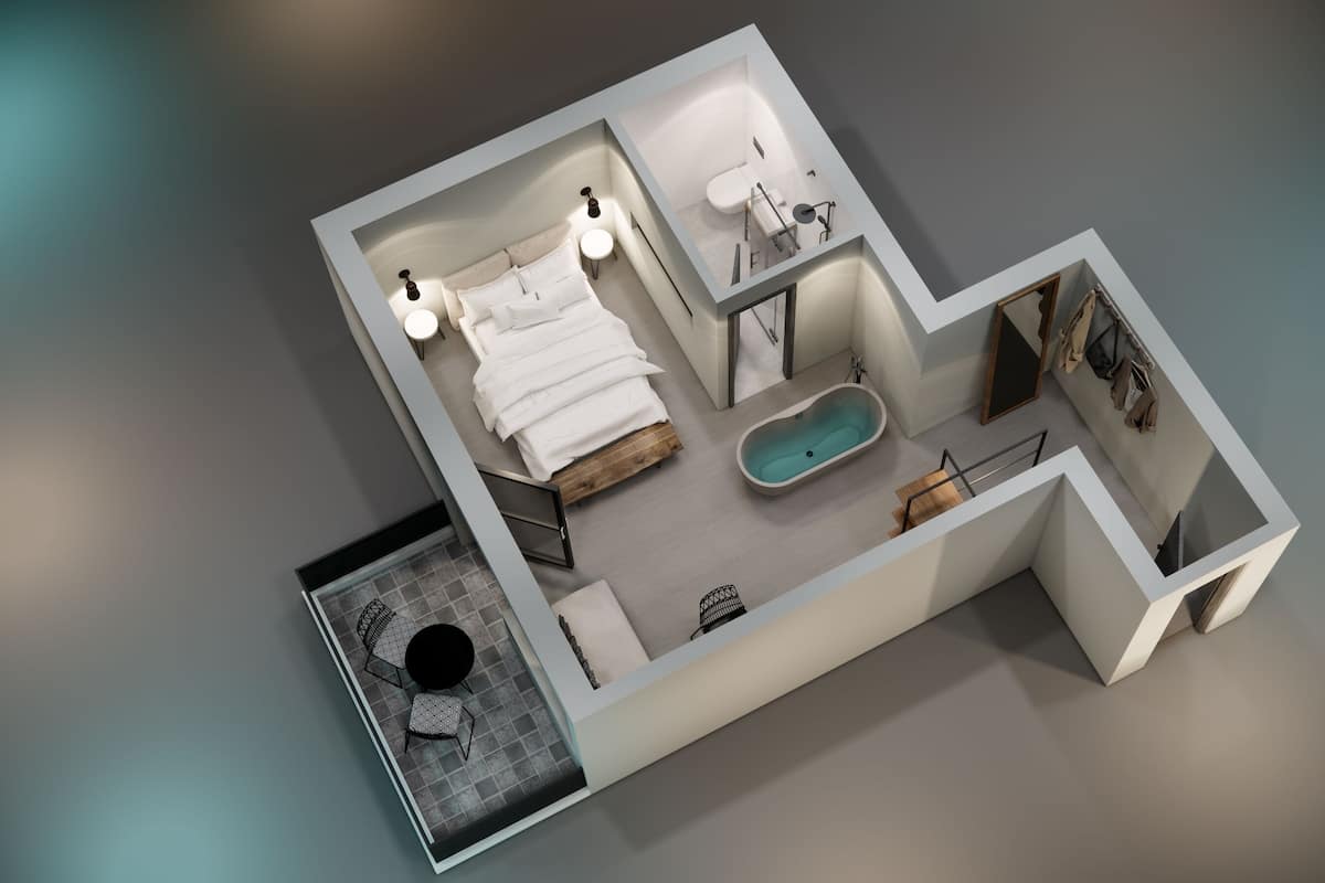A 3D model of a hotel room with a bed, a small bathroom, a seating area with a table and chairs, and a bathtub.
