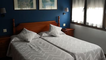 Blackout curtains, free cots/infant beds, free WiFi, bed sheets