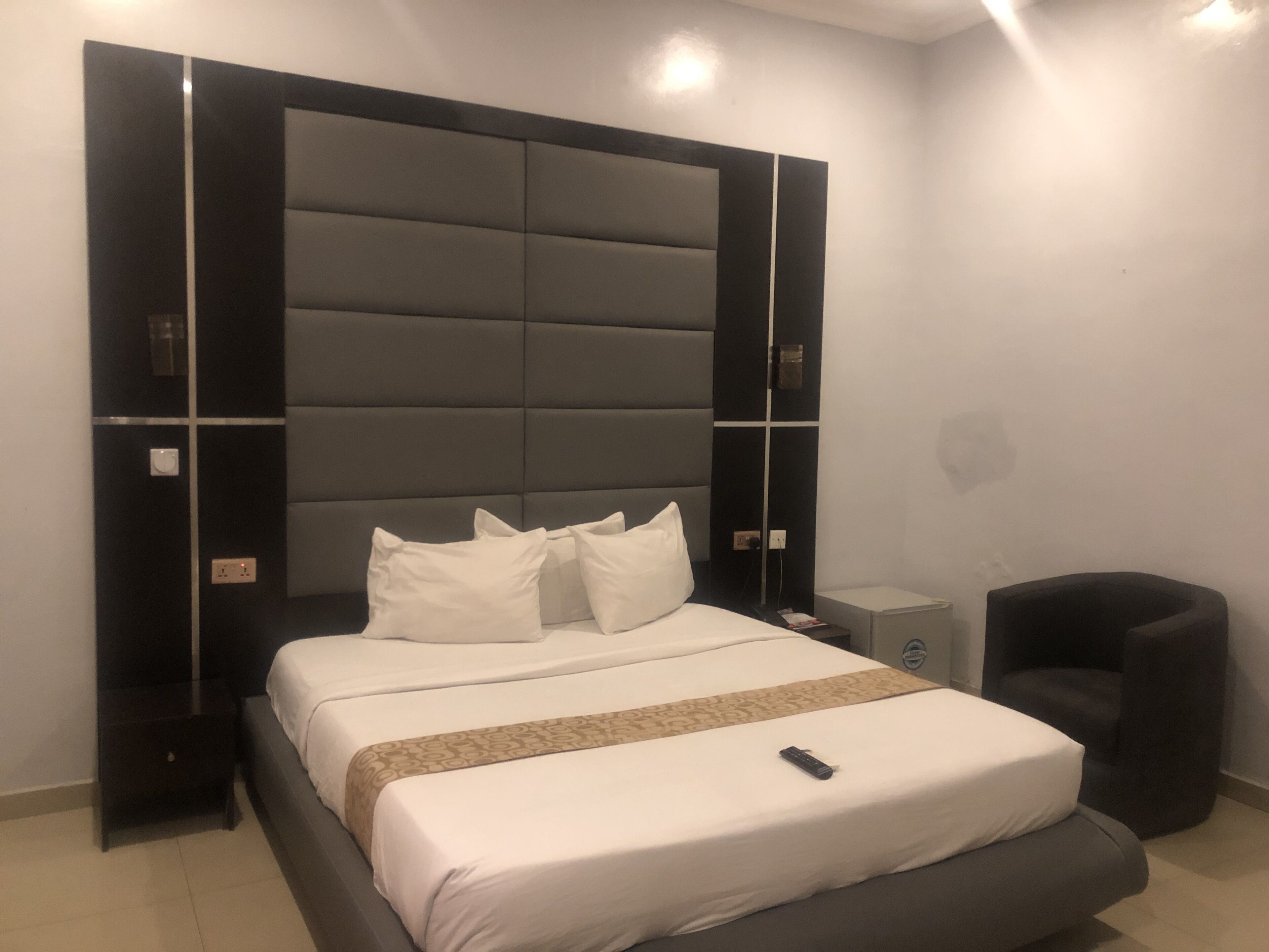 Desk, laptop workspace, bed sheets