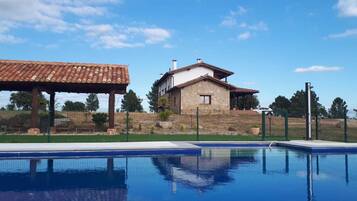 Outdoor pool, pool umbrellas, pool loungers