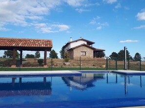 Outdoor pool, pool umbrellas, sun loungers