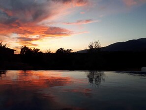 Outdoor pool, pool umbrellas, pool loungers
