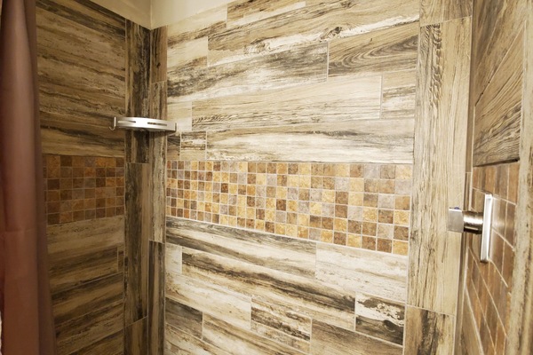Combined shower/tub, hair dryer, towels, toilet paper
