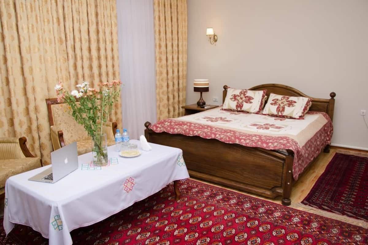 Premium bedding, desk, blackout curtains, iron/ironing board