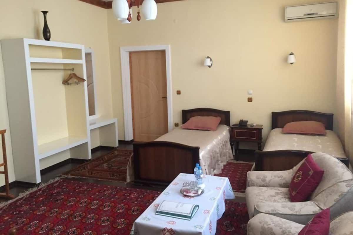Premium bedding, desk, blackout curtains, iron/ironing board