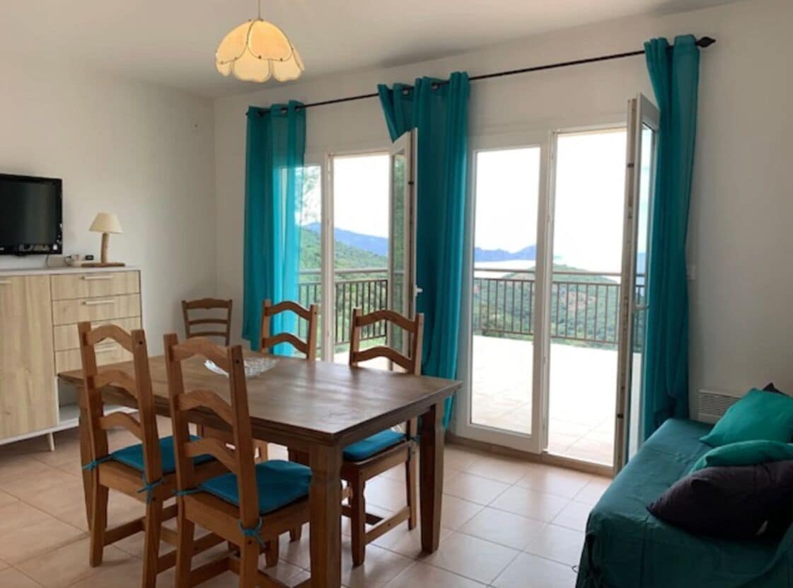 Economy Apartment, Balcony, Sea View | Living area | Flat-screen TV