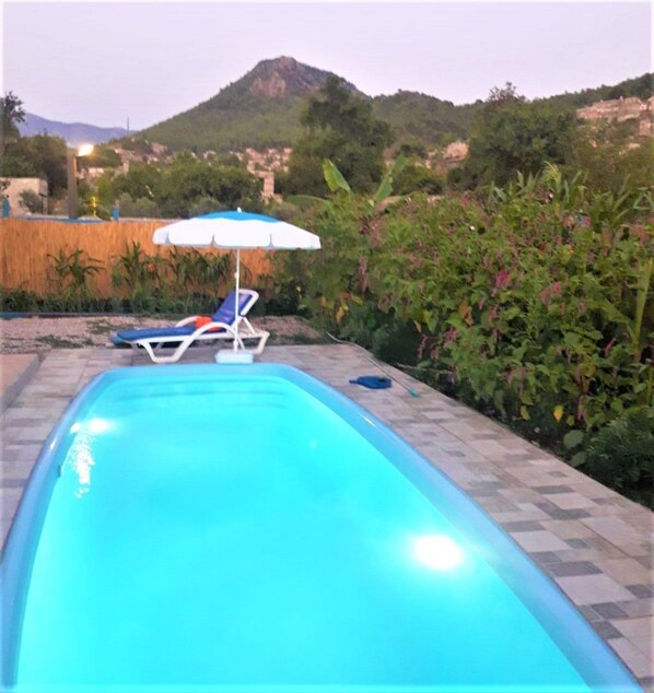 Outdoor pool, pool umbrellas, pool loungers