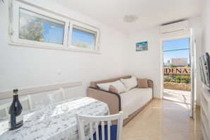 Appartement, 2 chambres, terrasse, vue jardin | Coin séjour