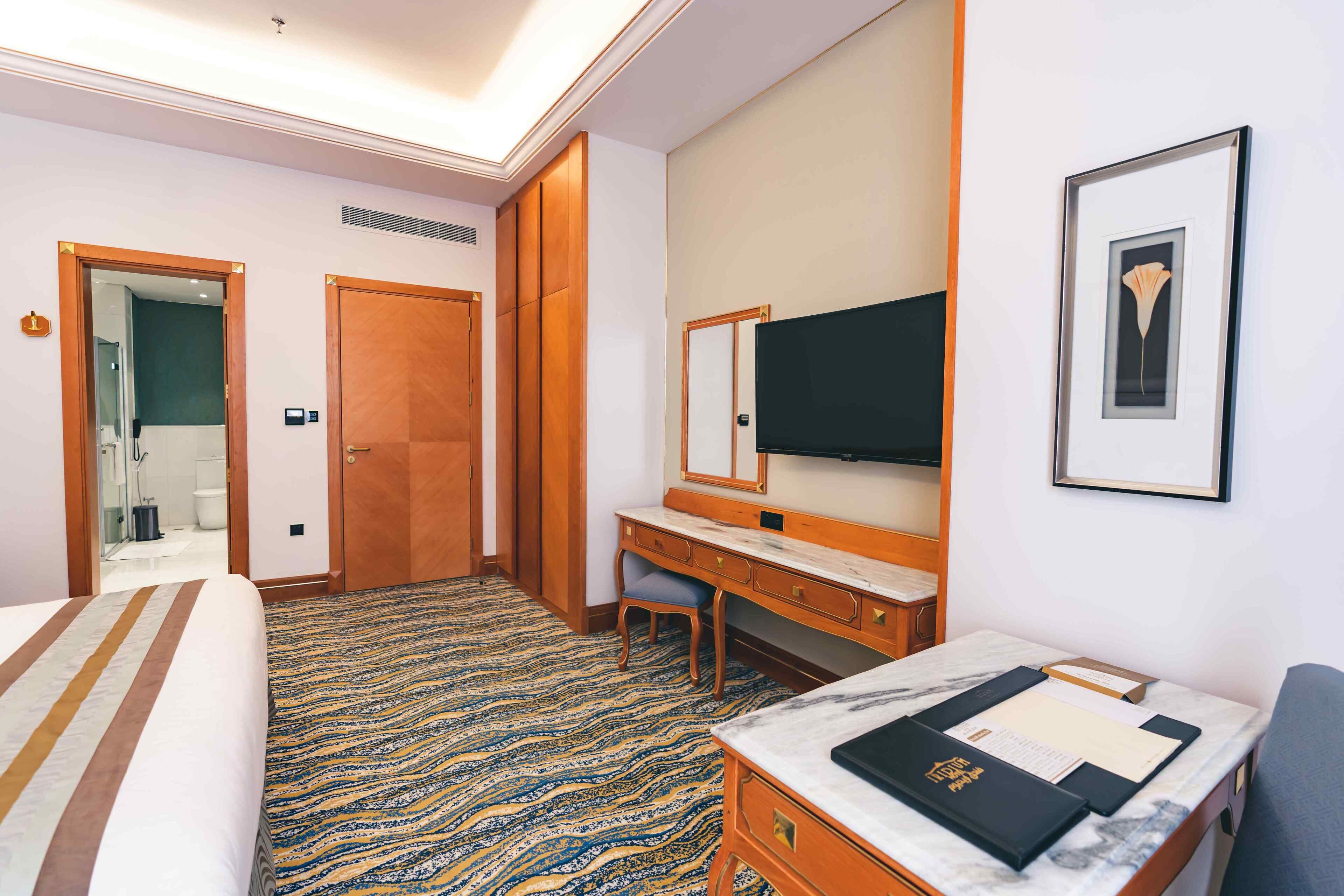 executive suite | 2 bedrooms, free minibar items, in-room safe, individually decorated