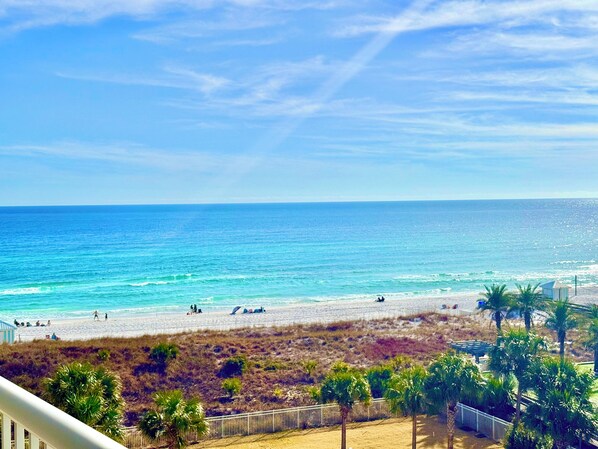 On the beach, sun-loungers, beach towels