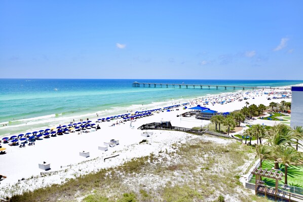 On the beach, sun-loungers, beach towels