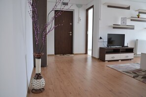 Departamento básico, 1 habitación | Sala de estar | Televisión LED 