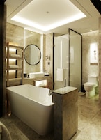 Deep soaking tub, rainfall showerhead, free toiletries, hair dryer