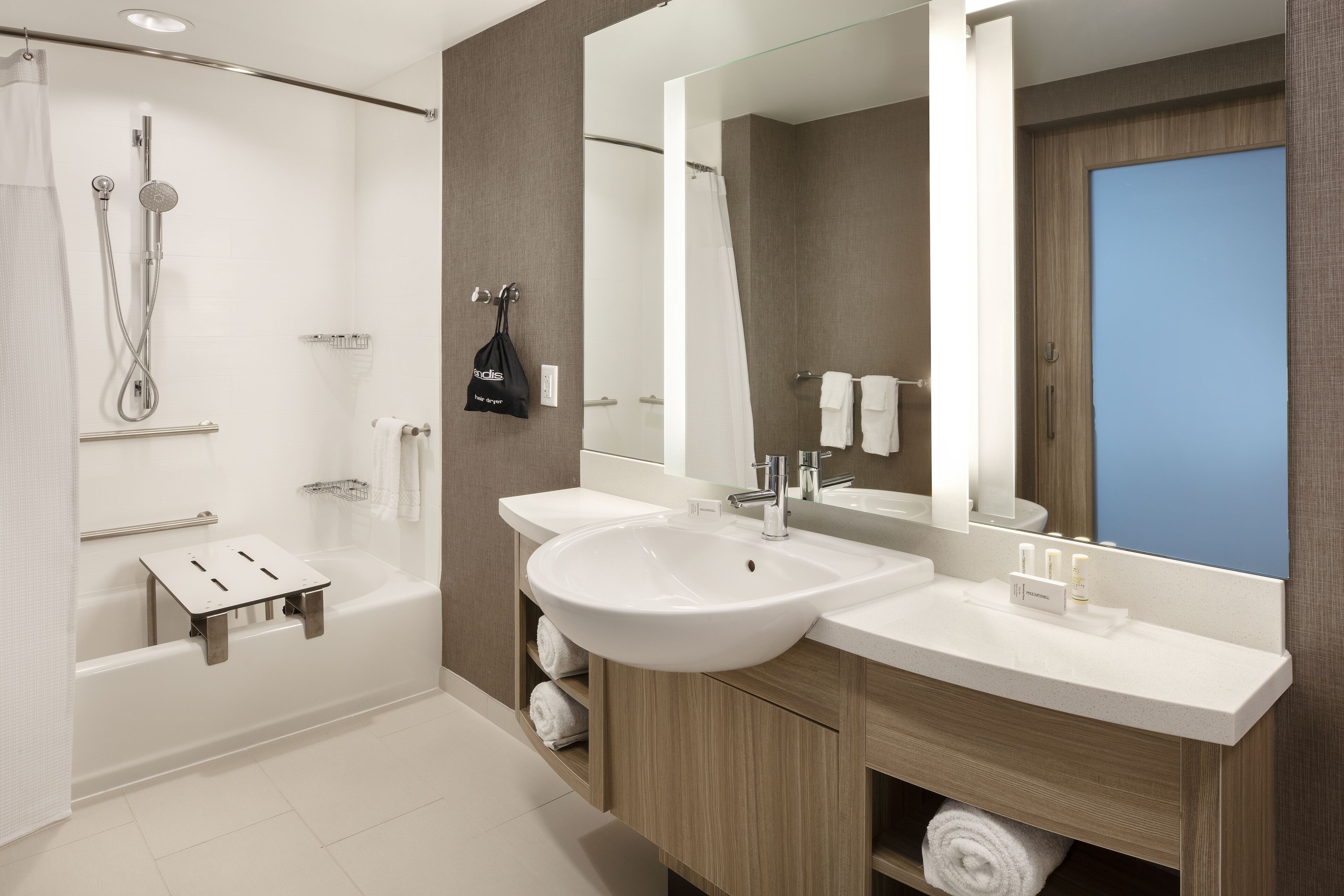 combined shower/bathtub, free toiletries, hair dryer, towels