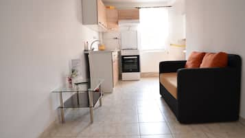 Appartement, 1 chambre | Coin séjour