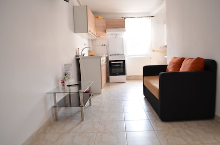 Apartamento, 1 quarto | Ćrea de estar | TV LED