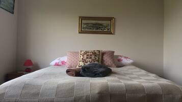 4 bedrooms, blackout curtains, iron/ironing board, free cots/infant beds