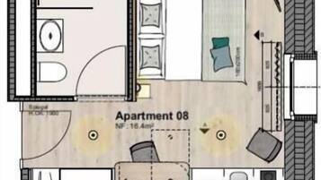 A floor plan of Apartment 08 with a bathroom, kitchenette, and a living area.