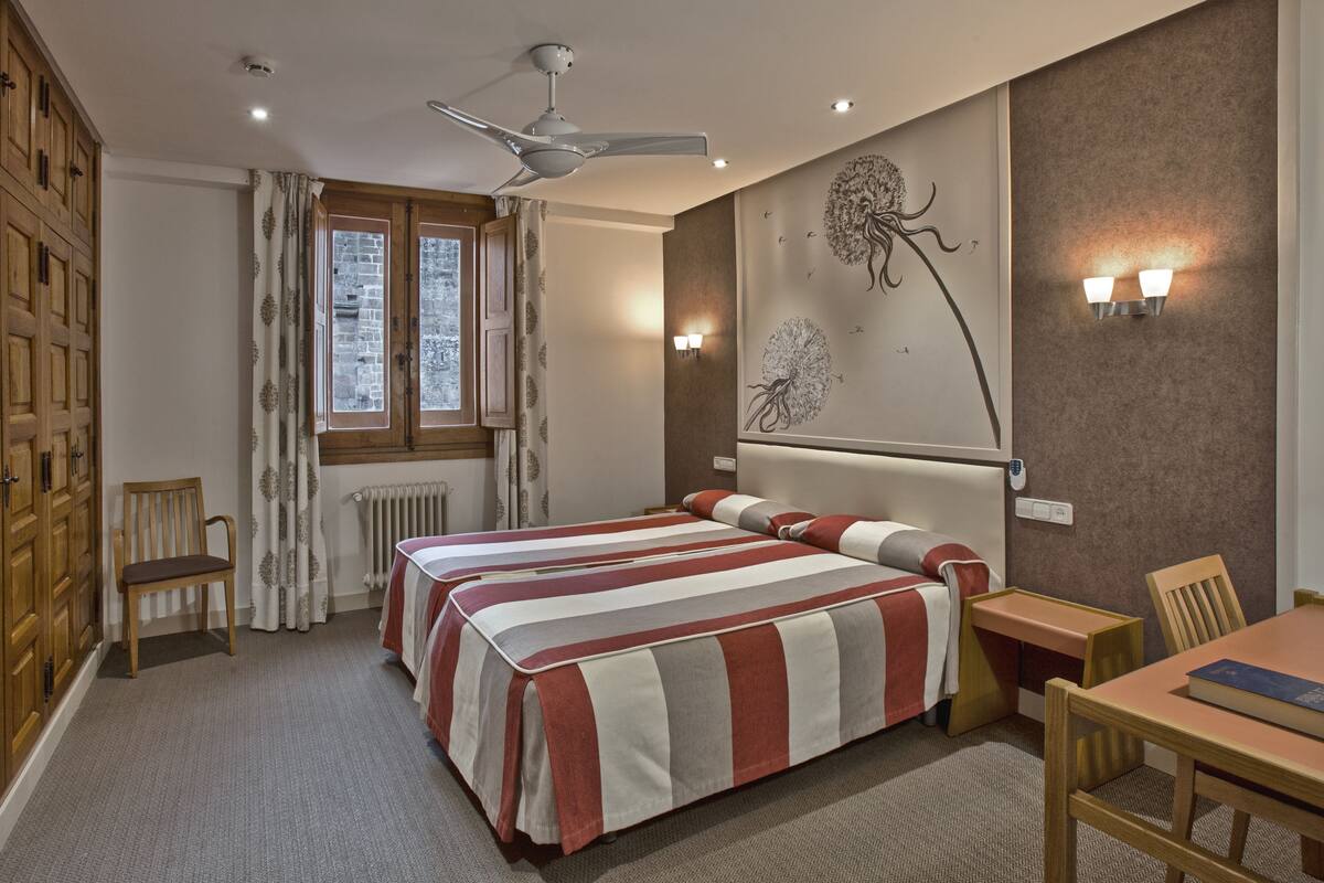 Desk, cribs (free), rollaway beds (surcharge), WiFi (free)