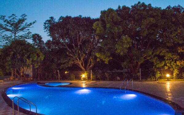 Outdoor pool, open 8:00 AM to 7:30 PM, pool loungers