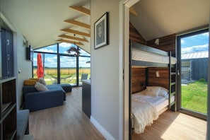 Comfort huisje | Een kluis op de kamer, verduisterende gordijnen, geluiddichte muren