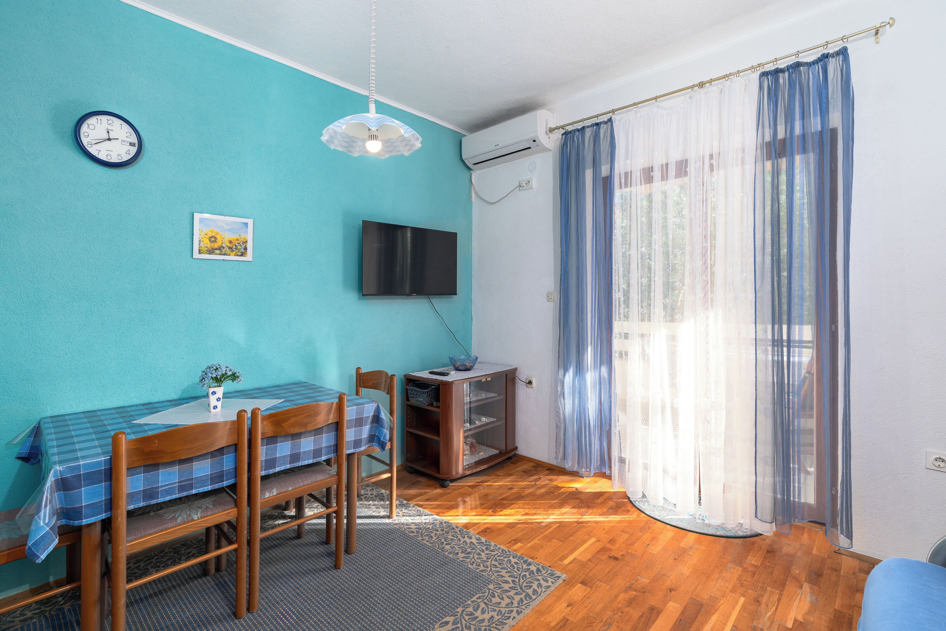 Comfort Apartment, Garden View | Living area | Flat-screen TV