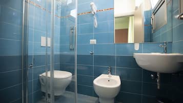 Shower, rainfall showerhead, free toiletries, hair dryer