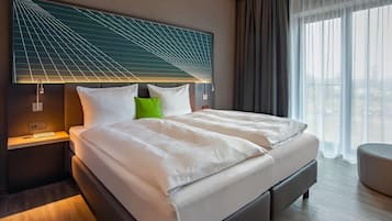 Hypo-allergenic bedding available, in-room safe, desk, laptop workspace
