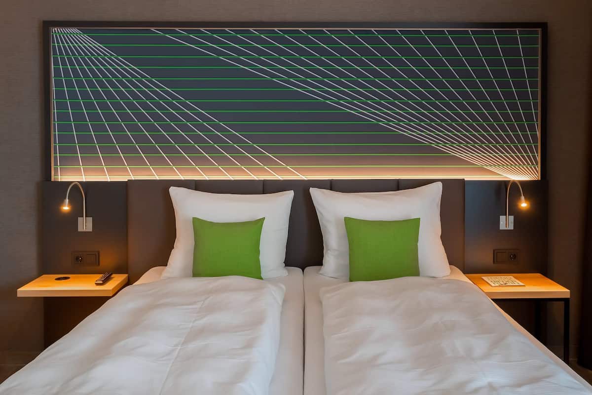 Hypo-allergenic bedding, in-room safe, desk, laptop workspace