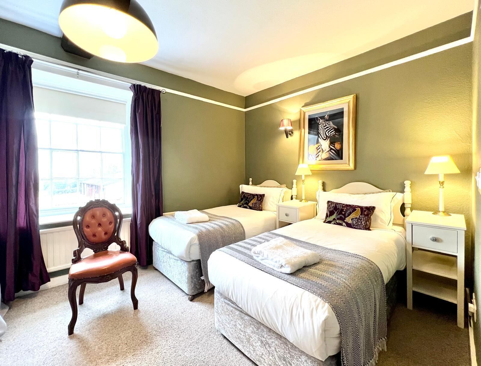 Deluxe Room, Ensuite, Courtyard View | Individually decorated, individually furnished, blackout drapes