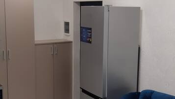 Apartment | Wohnbereich | Fernseher