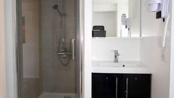 Shower, free toiletries, hair dryer, towels