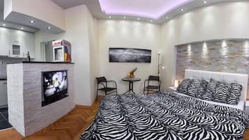Deluxe Studio | Living area | LCD TV