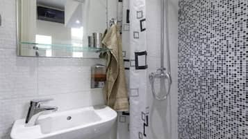 Shower, free toiletries, hair dryer, slippers