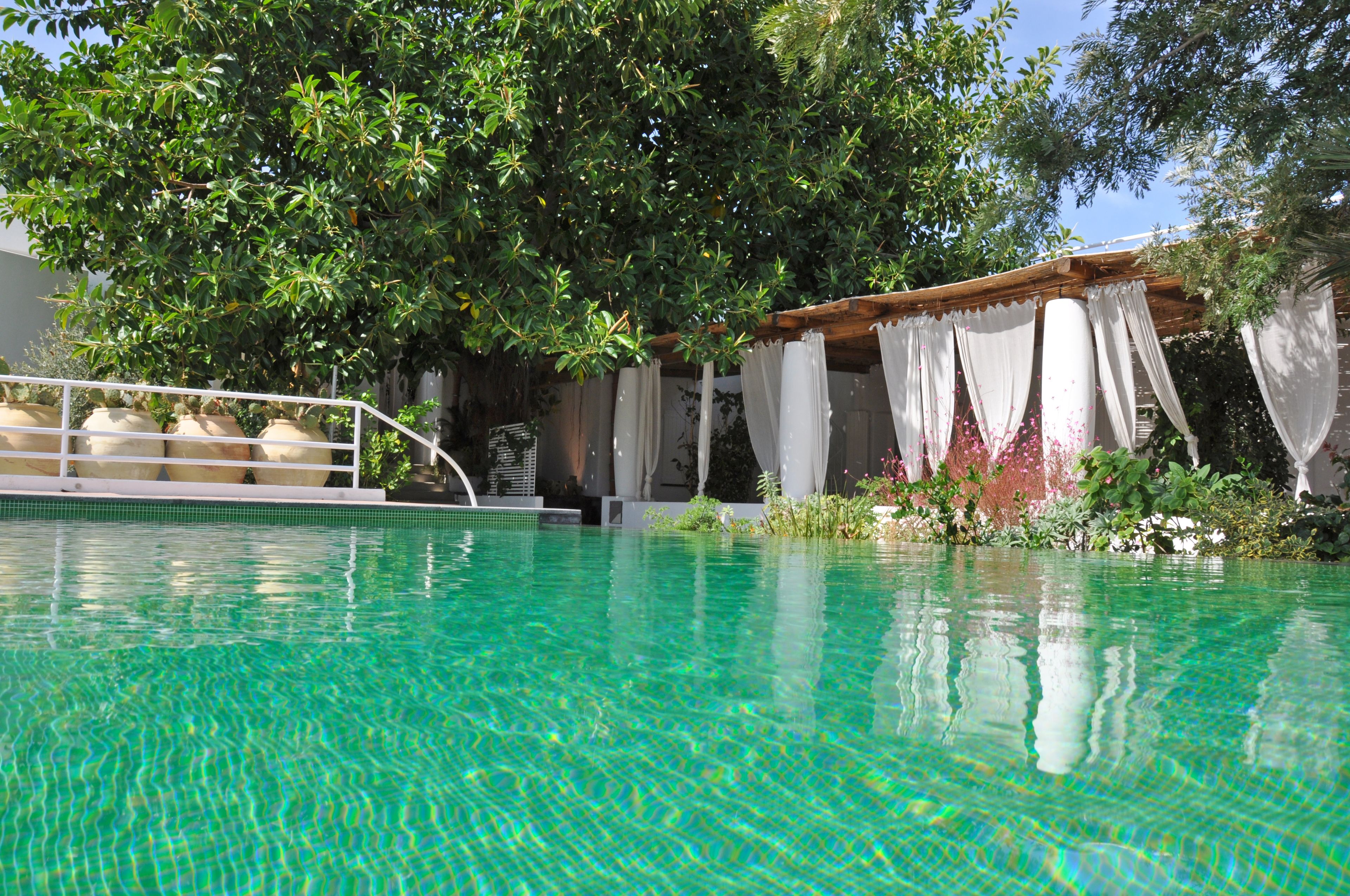 Seasonal outdoor pool, pool umbrellas, pool loungers