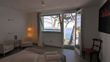 Luxury Apartment, 2 Bedrooms, Sea View (Scirocco) | Minibar, desk, blackout drapes, free cribs/infant beds