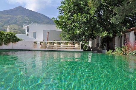 Seasonal outdoor pool, pool umbrellas, sun loungers
