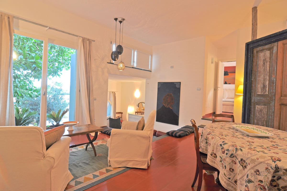 Luxury Apartment, 1 Bedroom, Terrace, Garden Area (Ponente) | Living area | Flat-screen TV