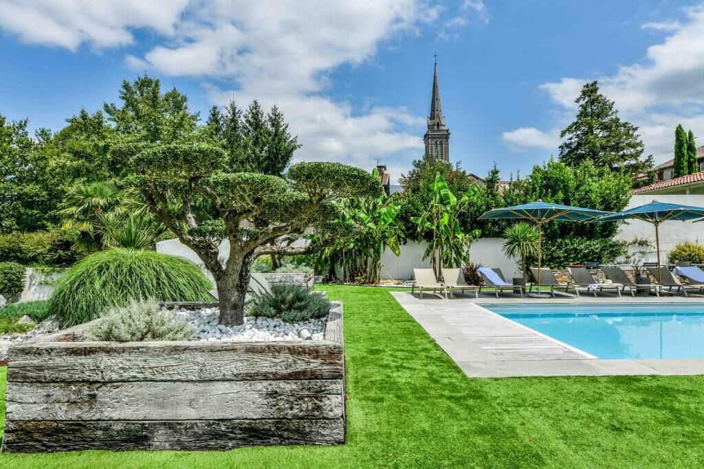 Seasonal outdoor pool, pool umbrellas, pool loungers