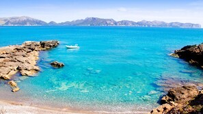 On the beach, sun-loungers, beach towels